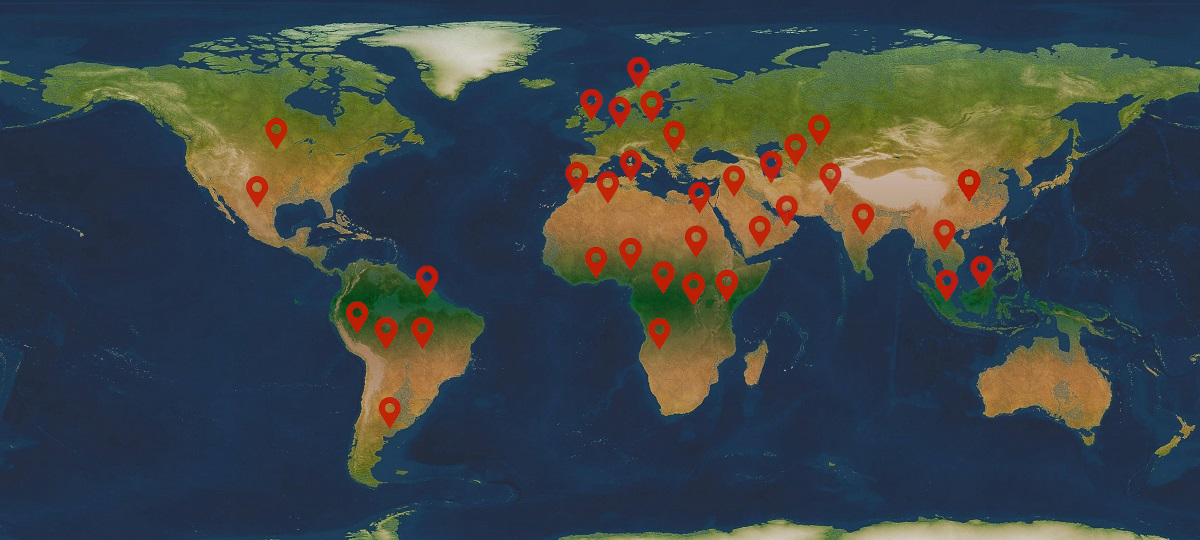 Image of a world map, with the locations we have delivered to marked with a red pointer.